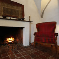 The fireplace in the Refectory